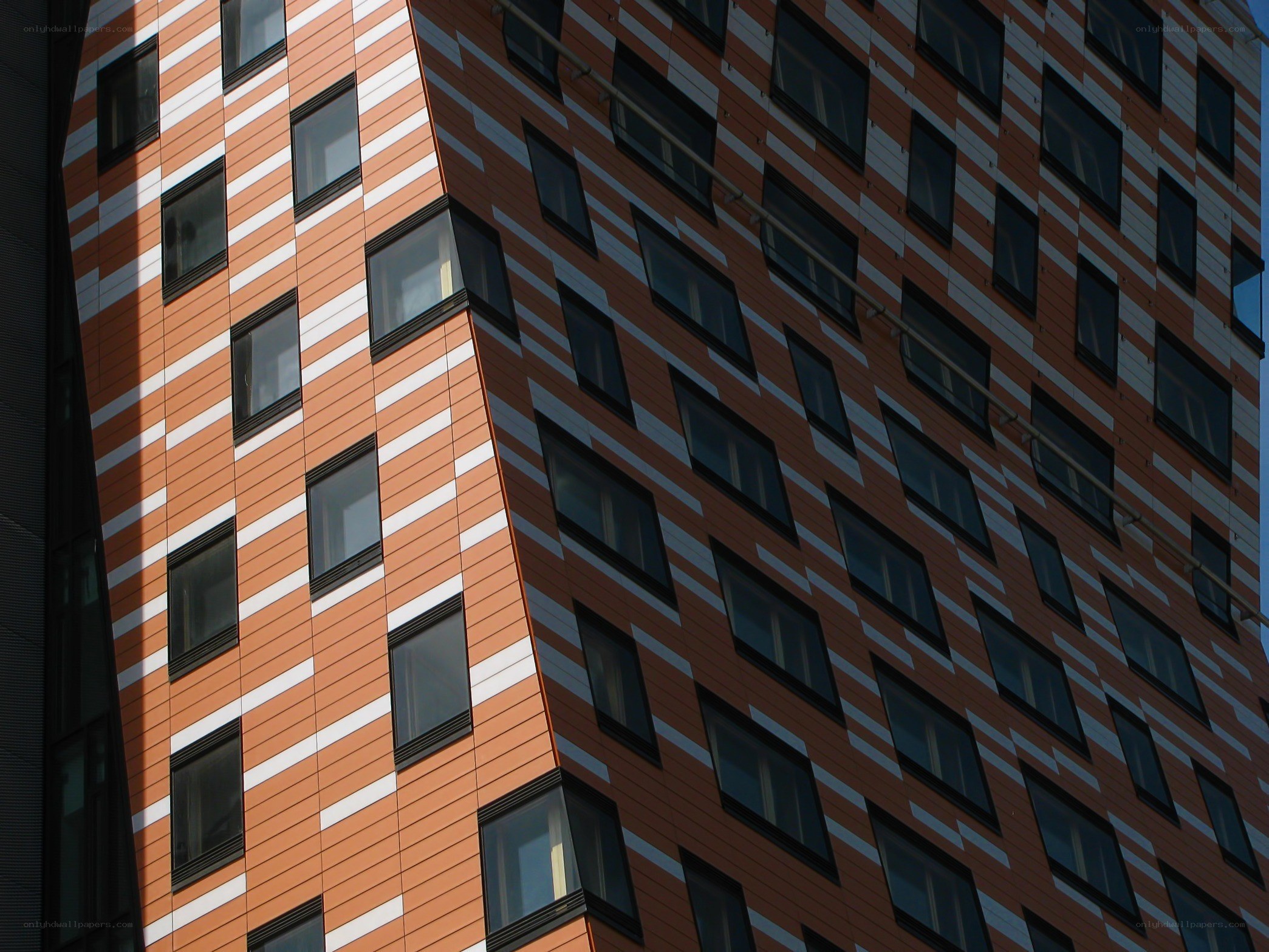 Modern building facade with diagonal stripes