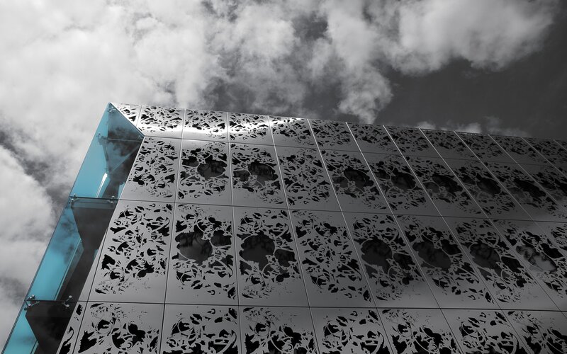 Modern building facade with perforated panels