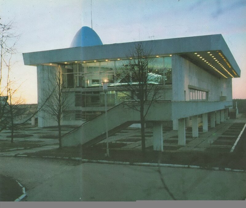 Modern building with dome at dusk