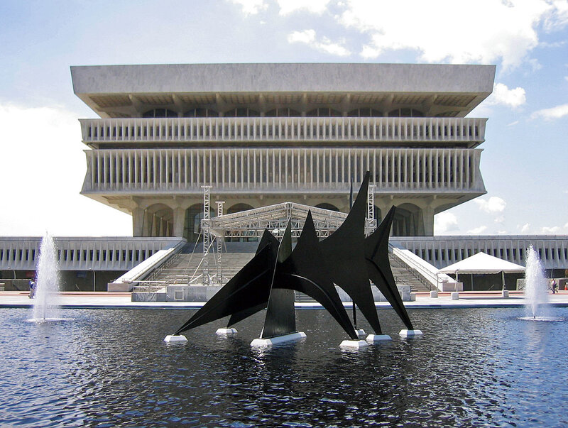 Modern building with fountain sculpture