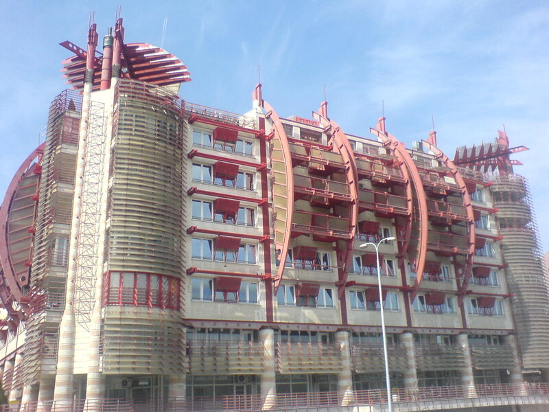 Modern Building with Red Arches