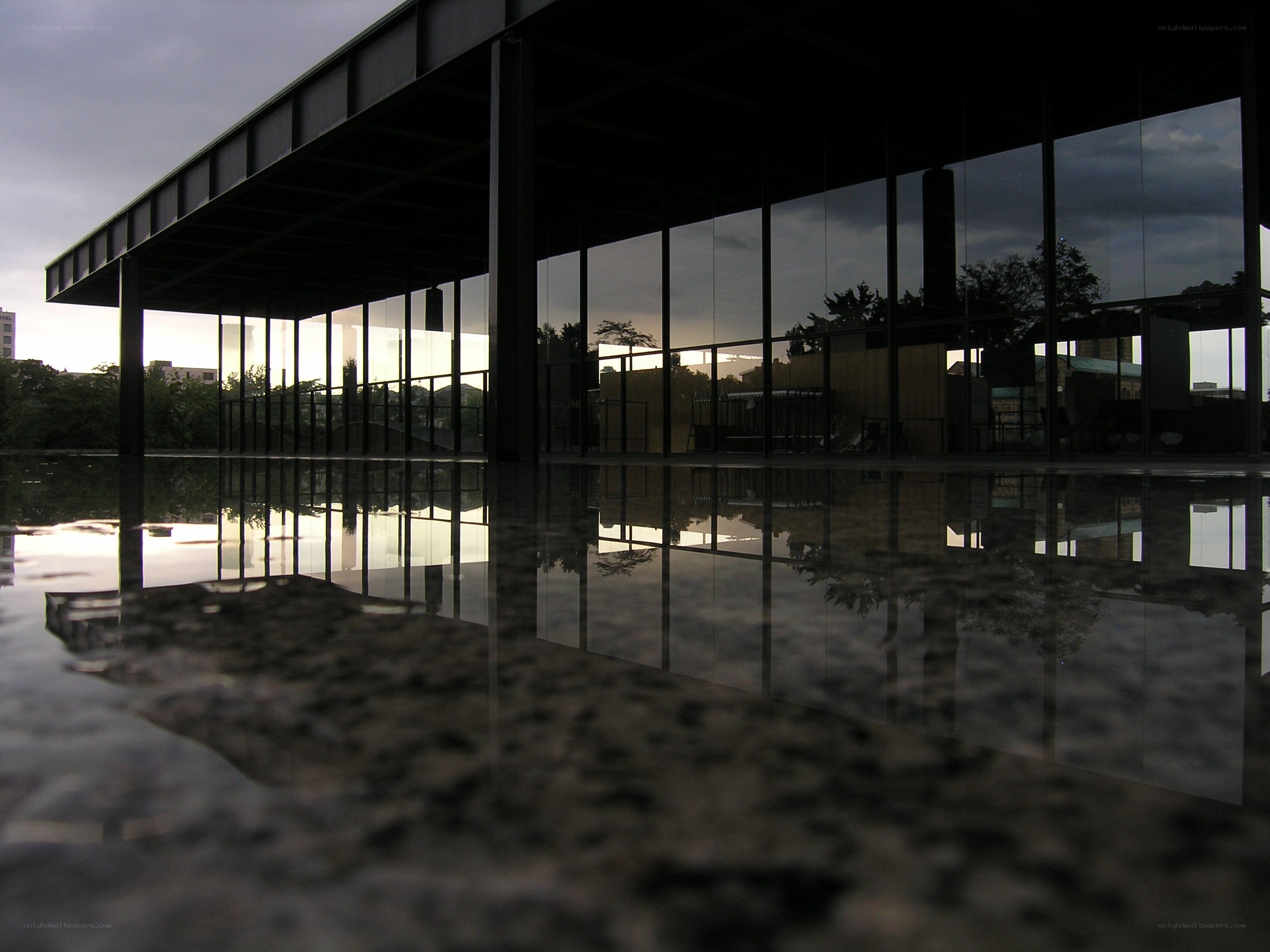 modern building with reflective pool