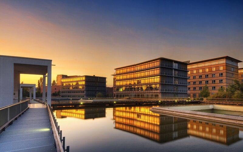 Modern Buildings at Sunset — Blue