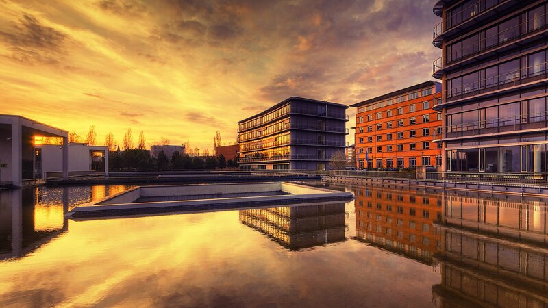 Modern Buildings at Sunset — Orange