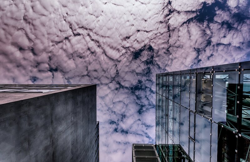 Modern Buildings under Clouds