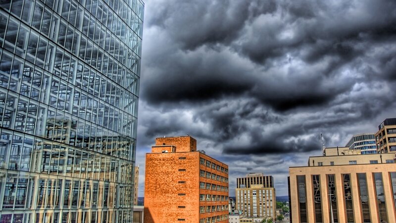 Modern Buildings under Stormy Sky — Gray