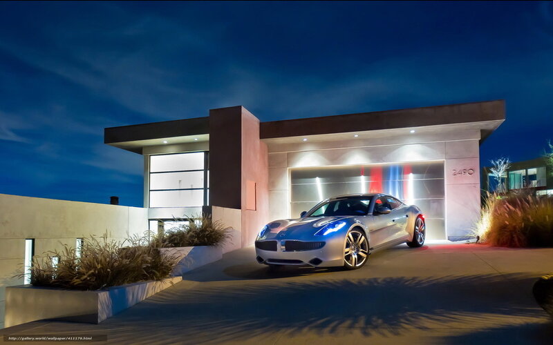 Modern car at a luxury home