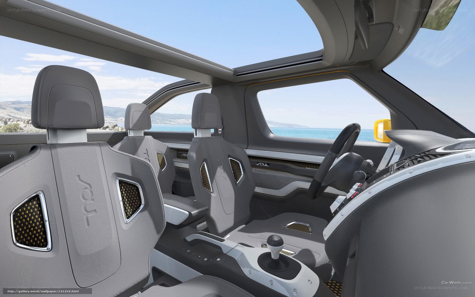Modern car interior with ocean view