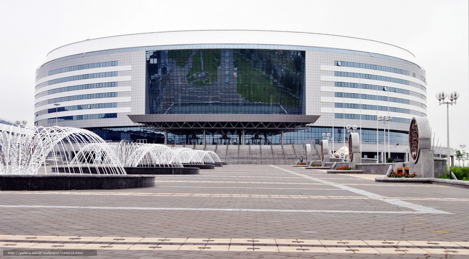 Modern circular building with fountain