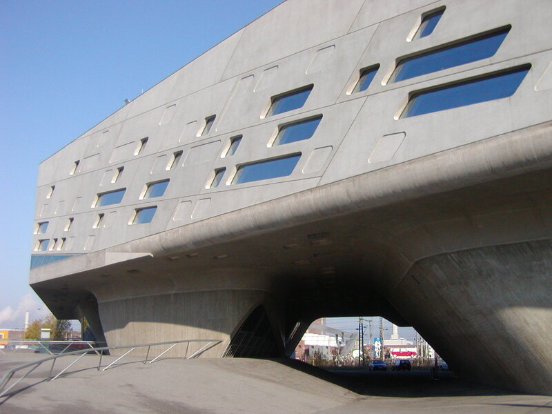 modern concrete building with geometric windows