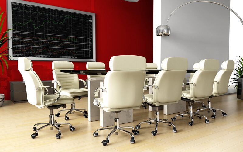 Modern conference room with financial charts
