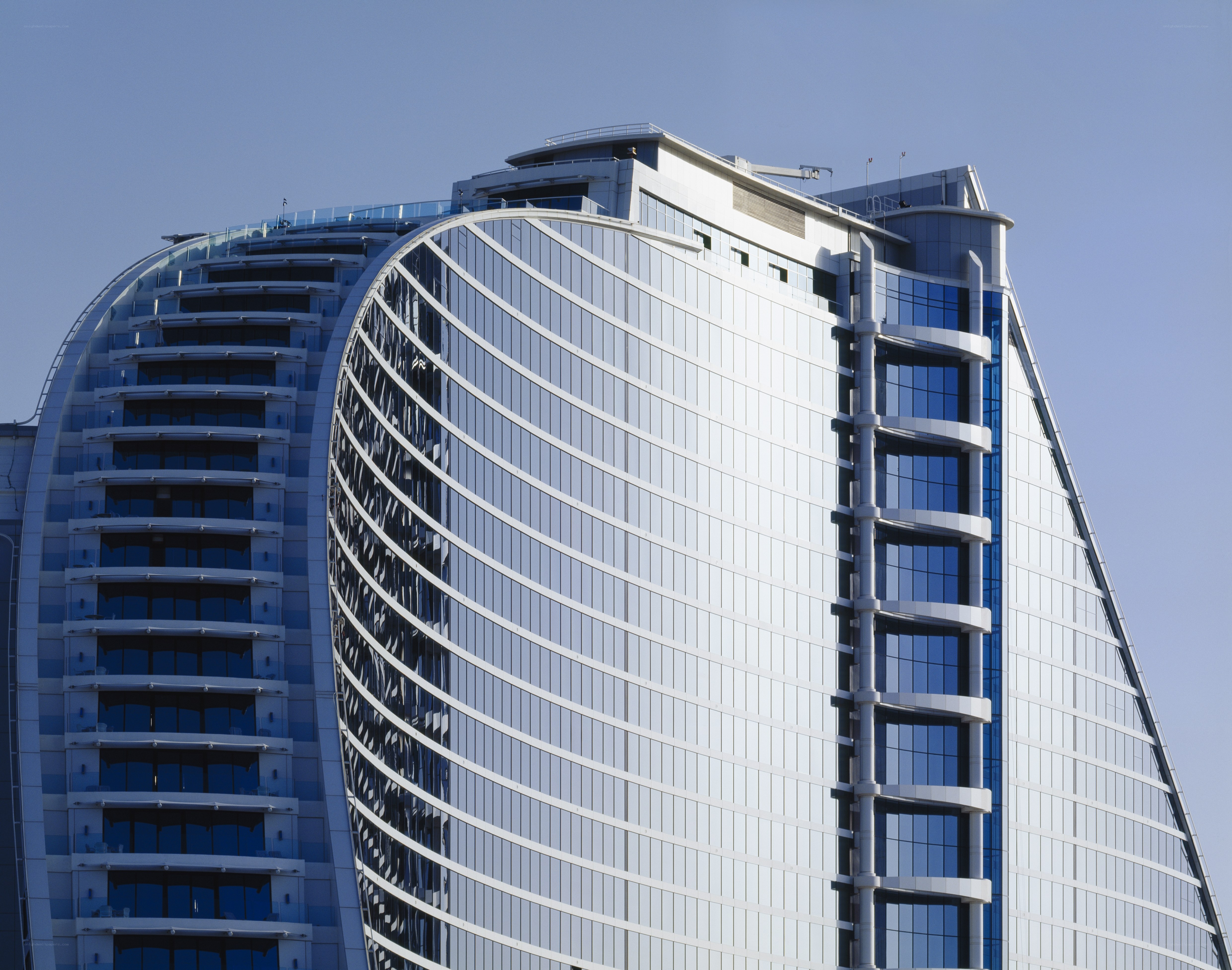 modern curved glass skyscraper