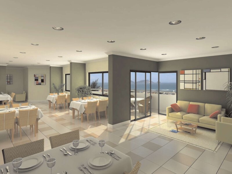 Modern dining and living area with ocean view