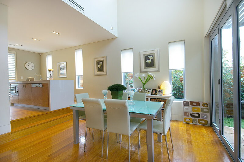 Modern dining area with kitchen view