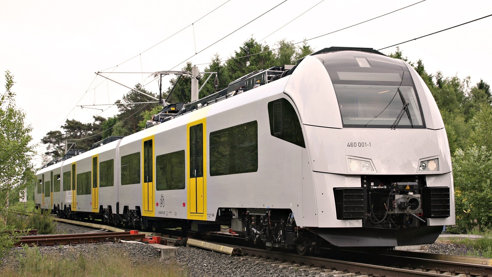 modern electric train on tracks
