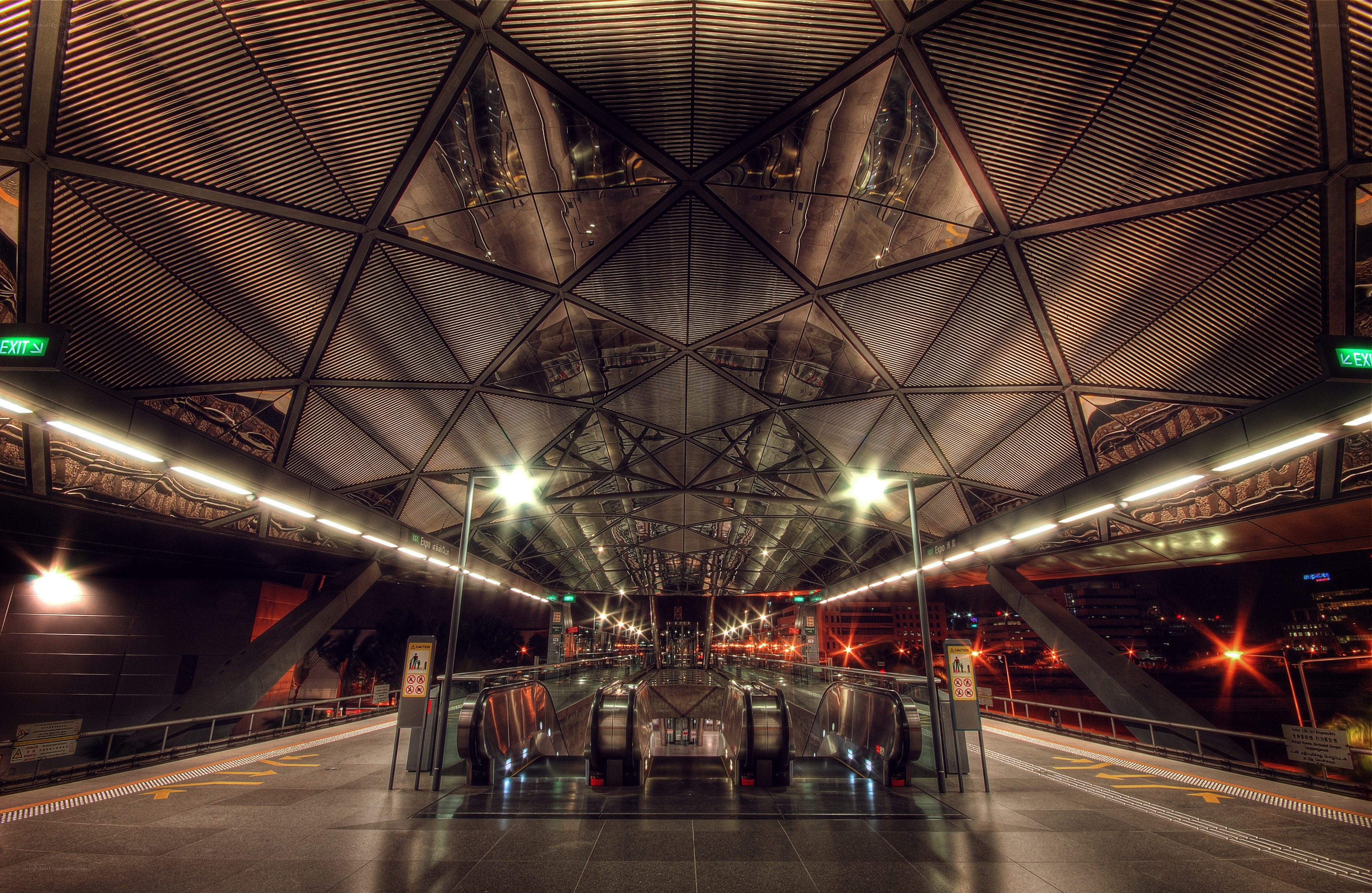 modern escalator station at night