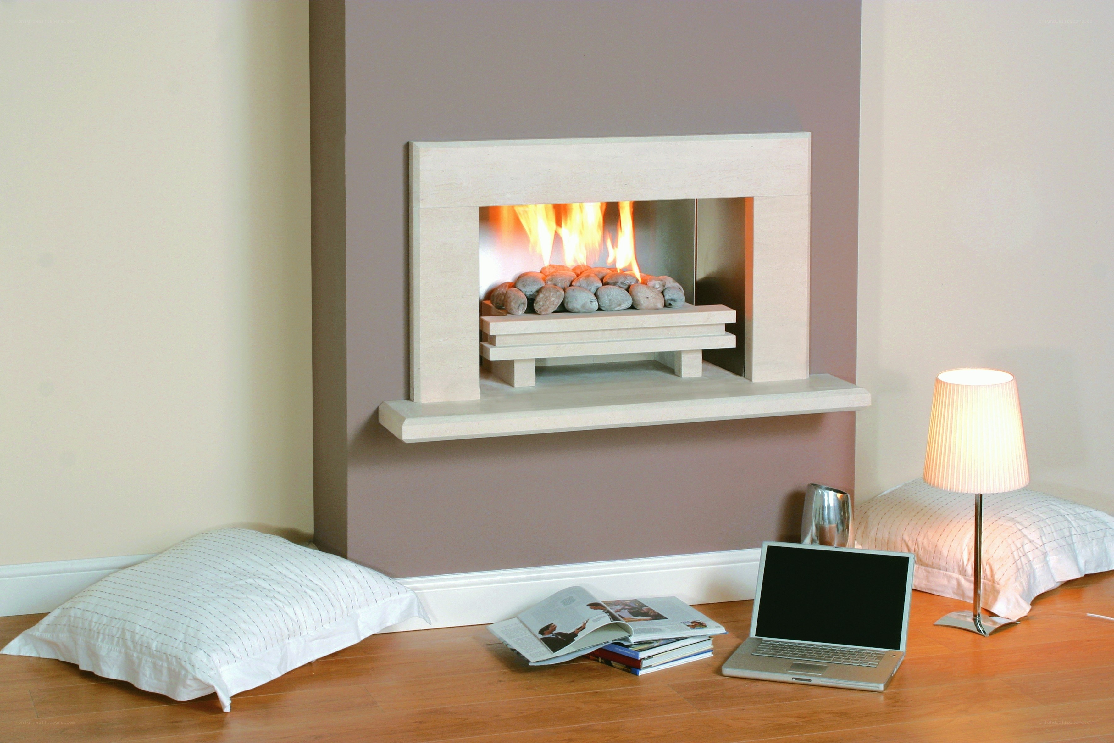 Modern fireplace with laptop