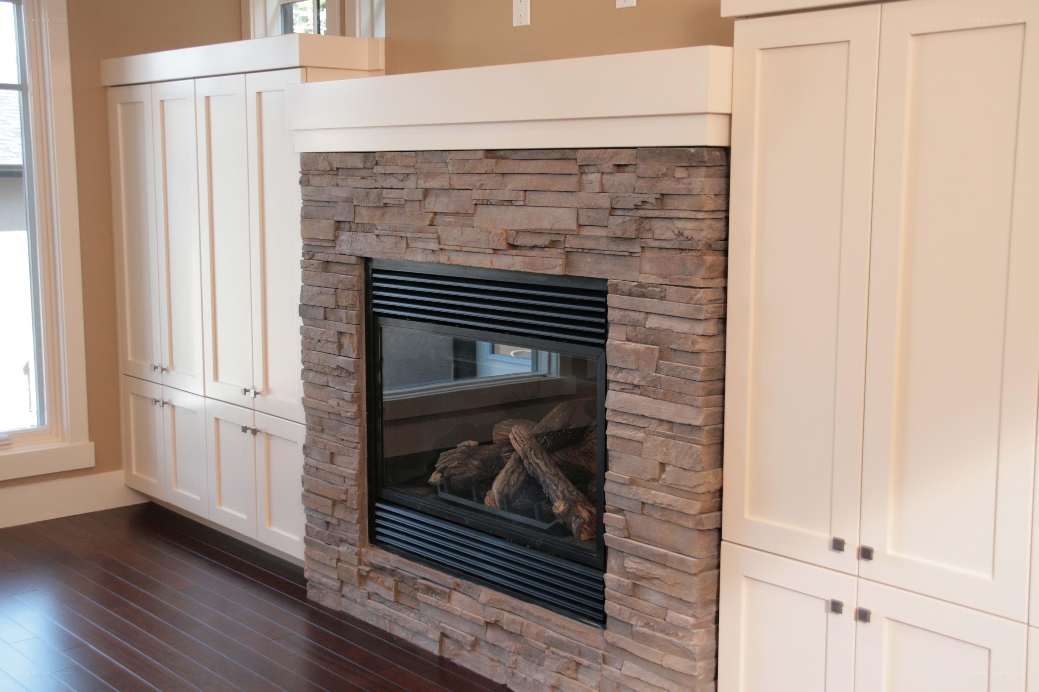 Modern fireplace with stone surround