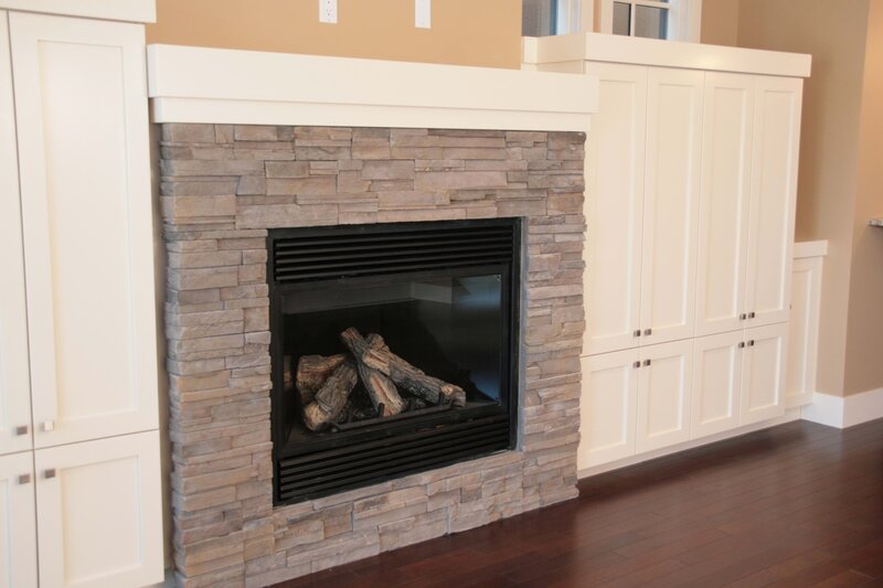 modern fireplace with stone surround