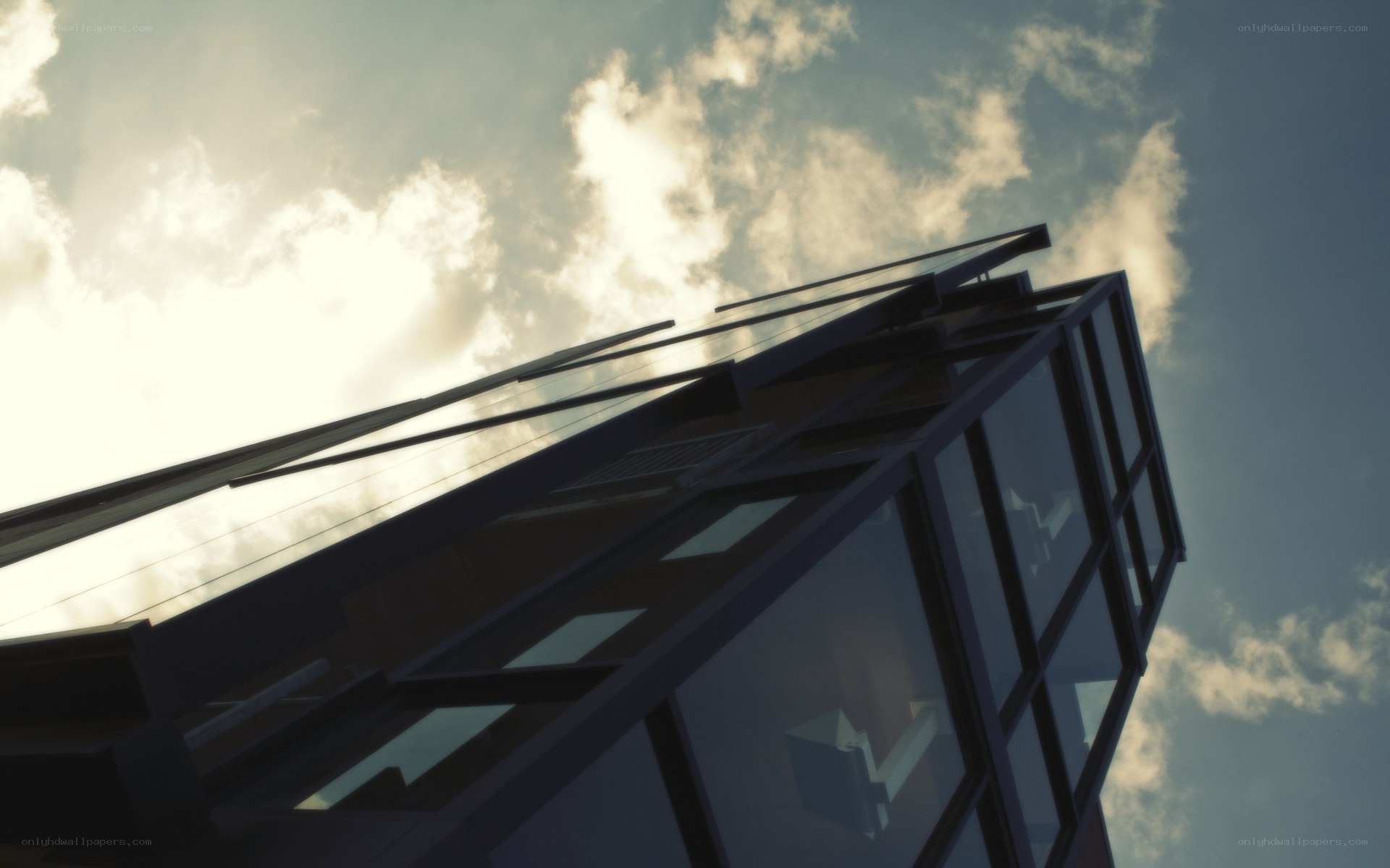 modern glass building against sky