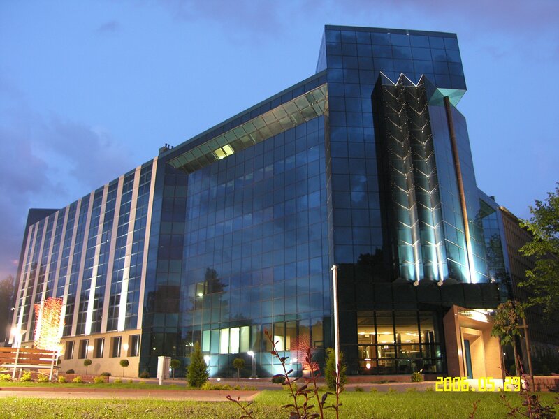 modern glass building at dusk
