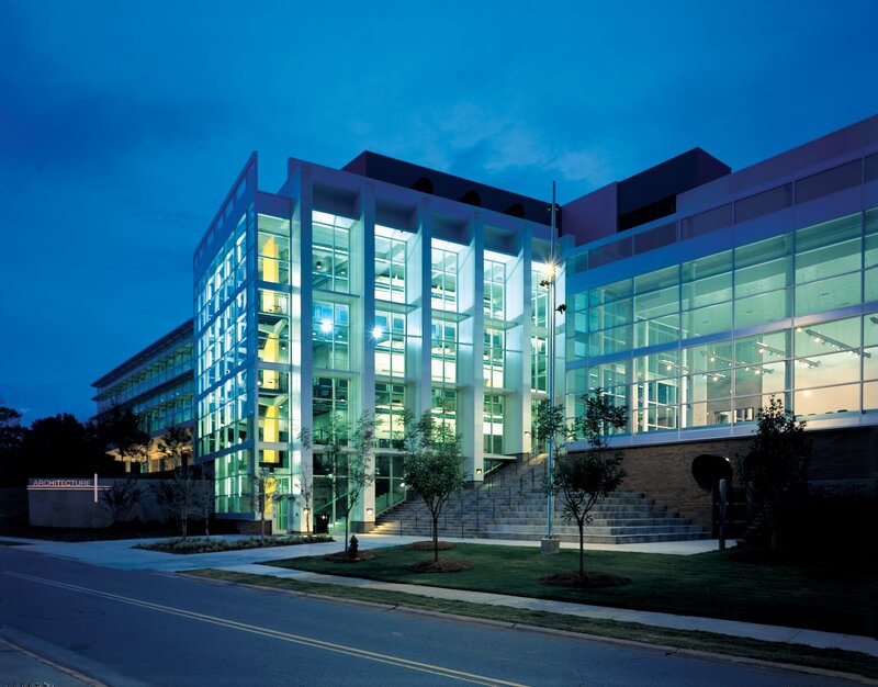 modern glass building at dusk