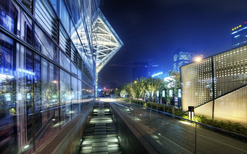 Modern Glass Building at Night — Blue, Dramatic