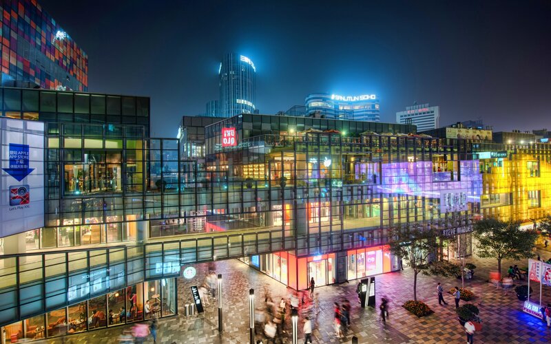 Modern Glass Building at Night — Blue
