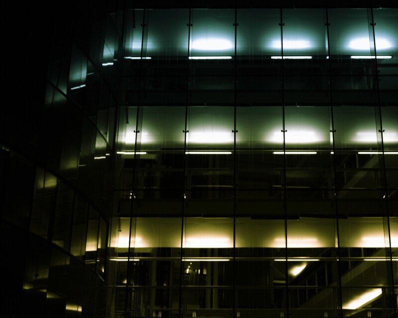 modern glass building at night