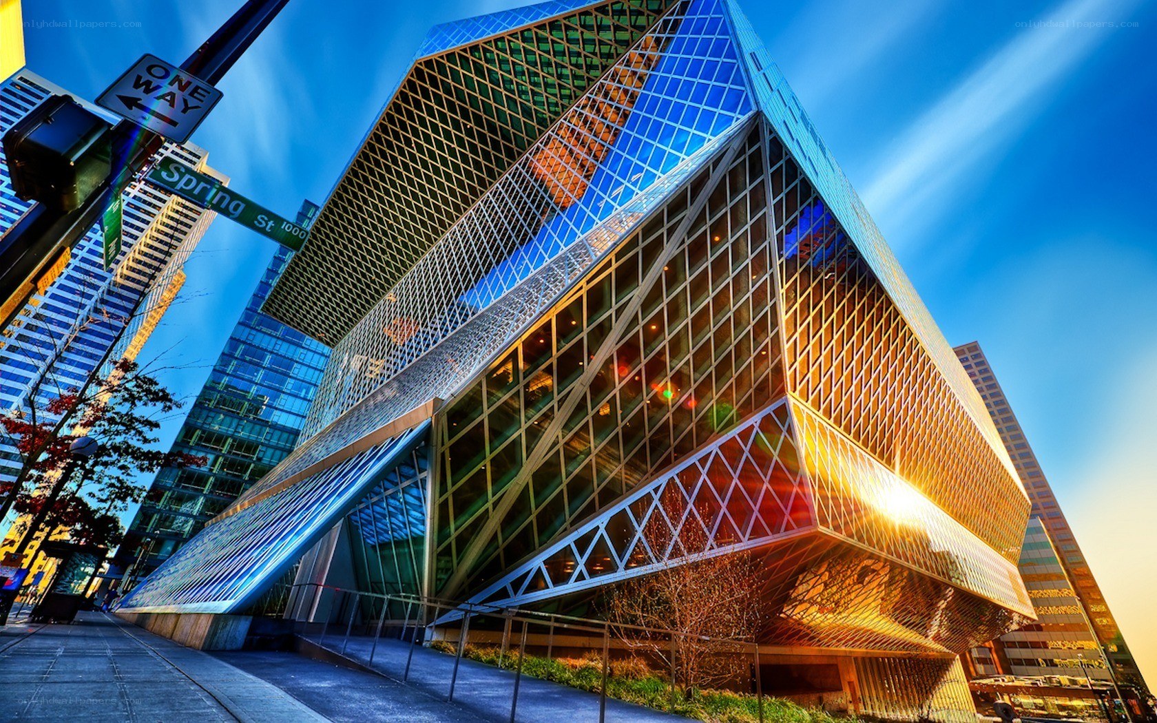 Modern glass building at sunset