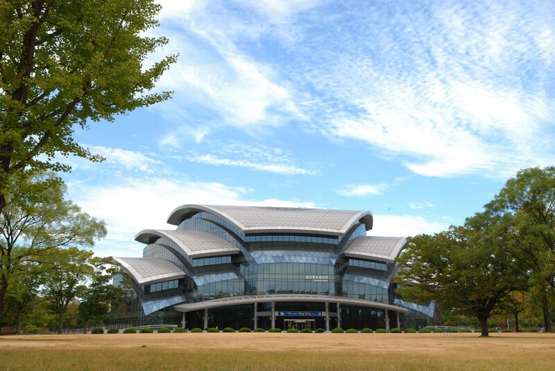 Modern Glass Building — Blue, Serene, Afternoon