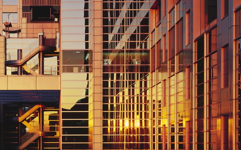 Modern Glass Building — Orange, Dramatic