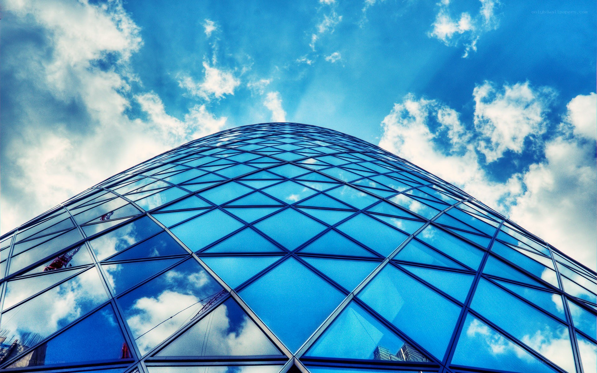 modern glass building under blue sky