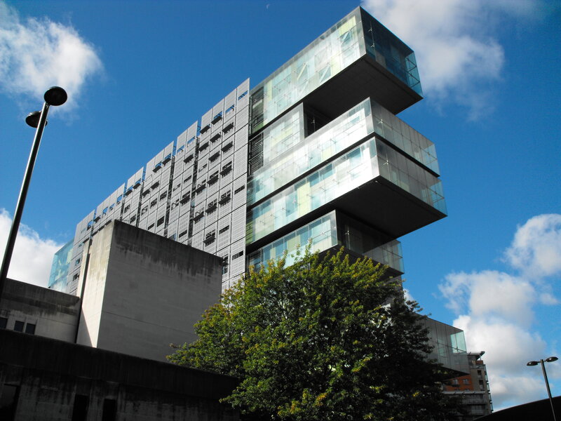 Modern glass building with blue sky