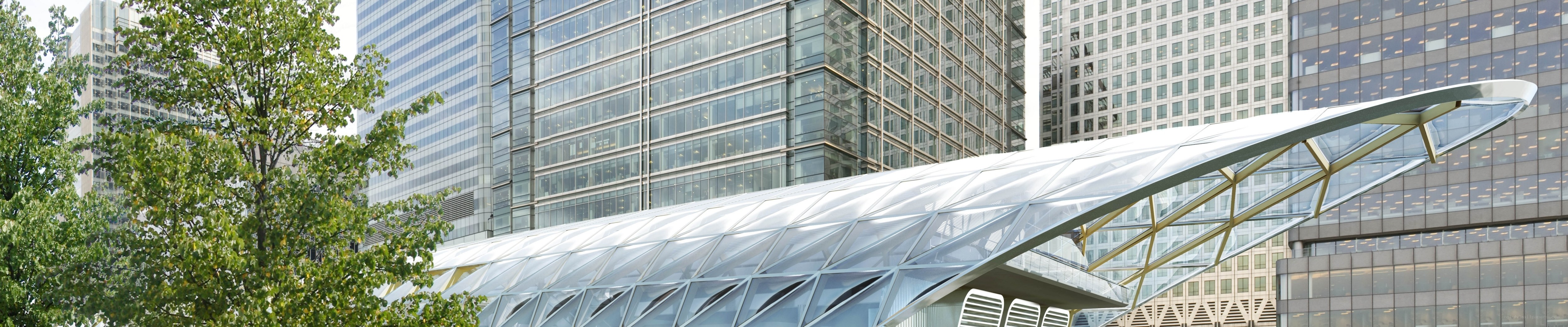 Modern glass building with canopy