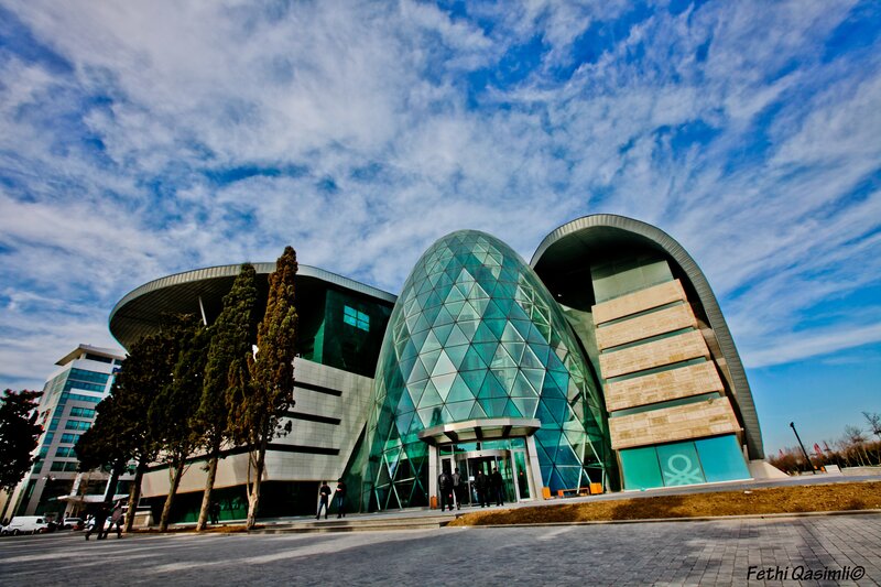 modern glass building with dome