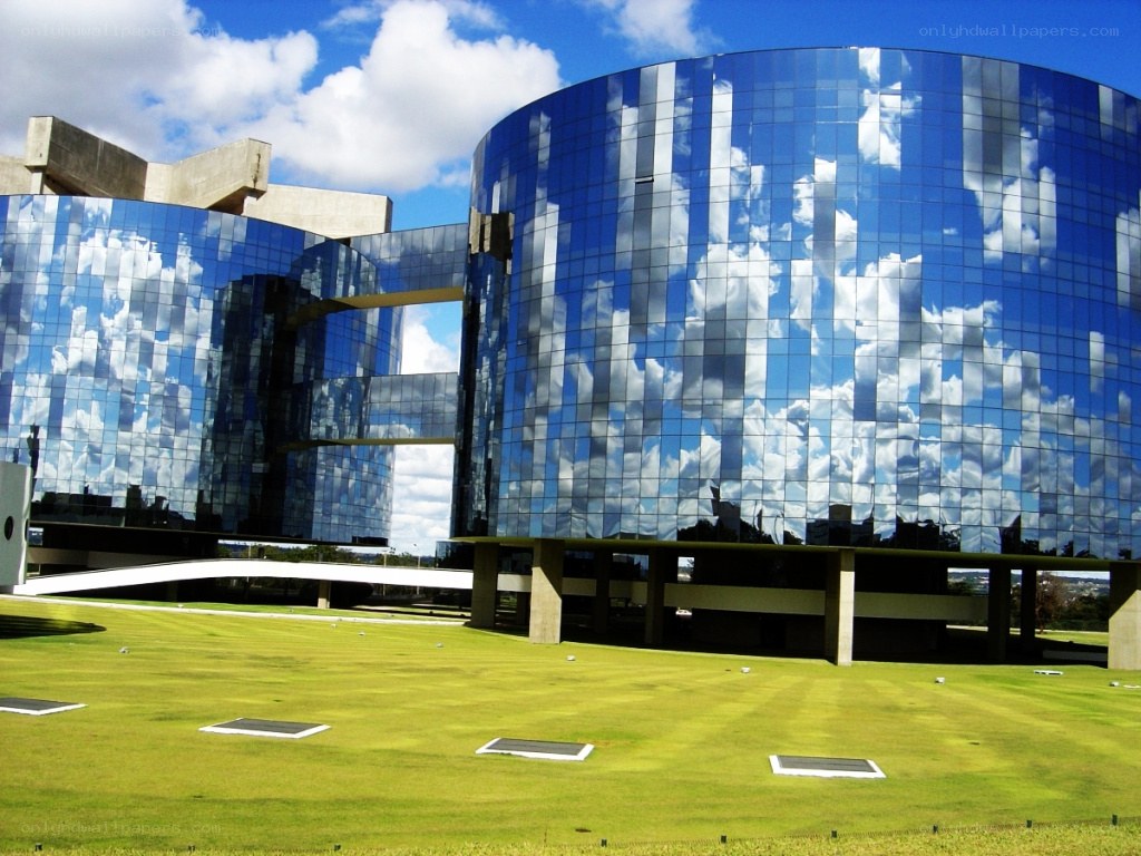 modern glass building with sky reflection