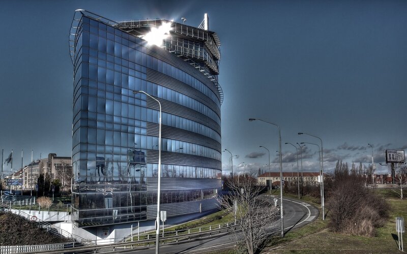 modern glass building with sun glare