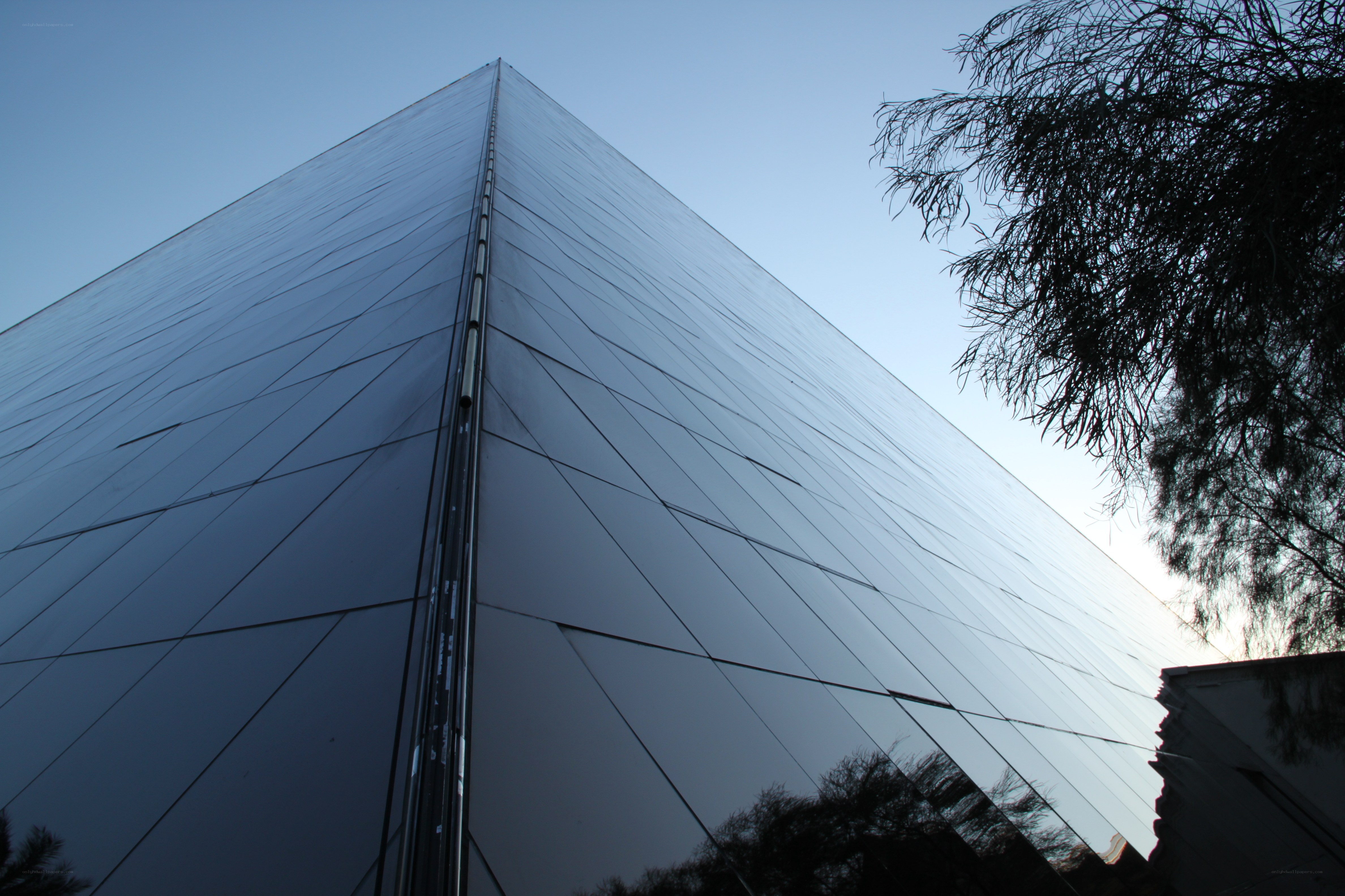 modern glass pyramid building
