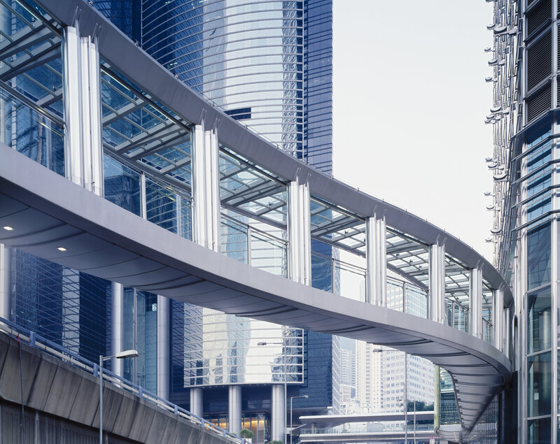Modern glass skybridge in city