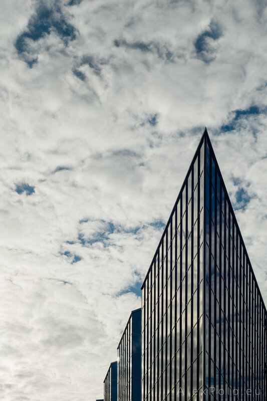 Modern Glass Skyscraper — Blue, Dramatic, Afternoon, Photograph, Clouds, Sky
