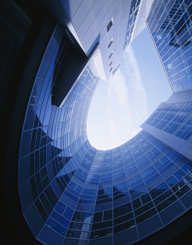 modern glass skyscraper courtyard