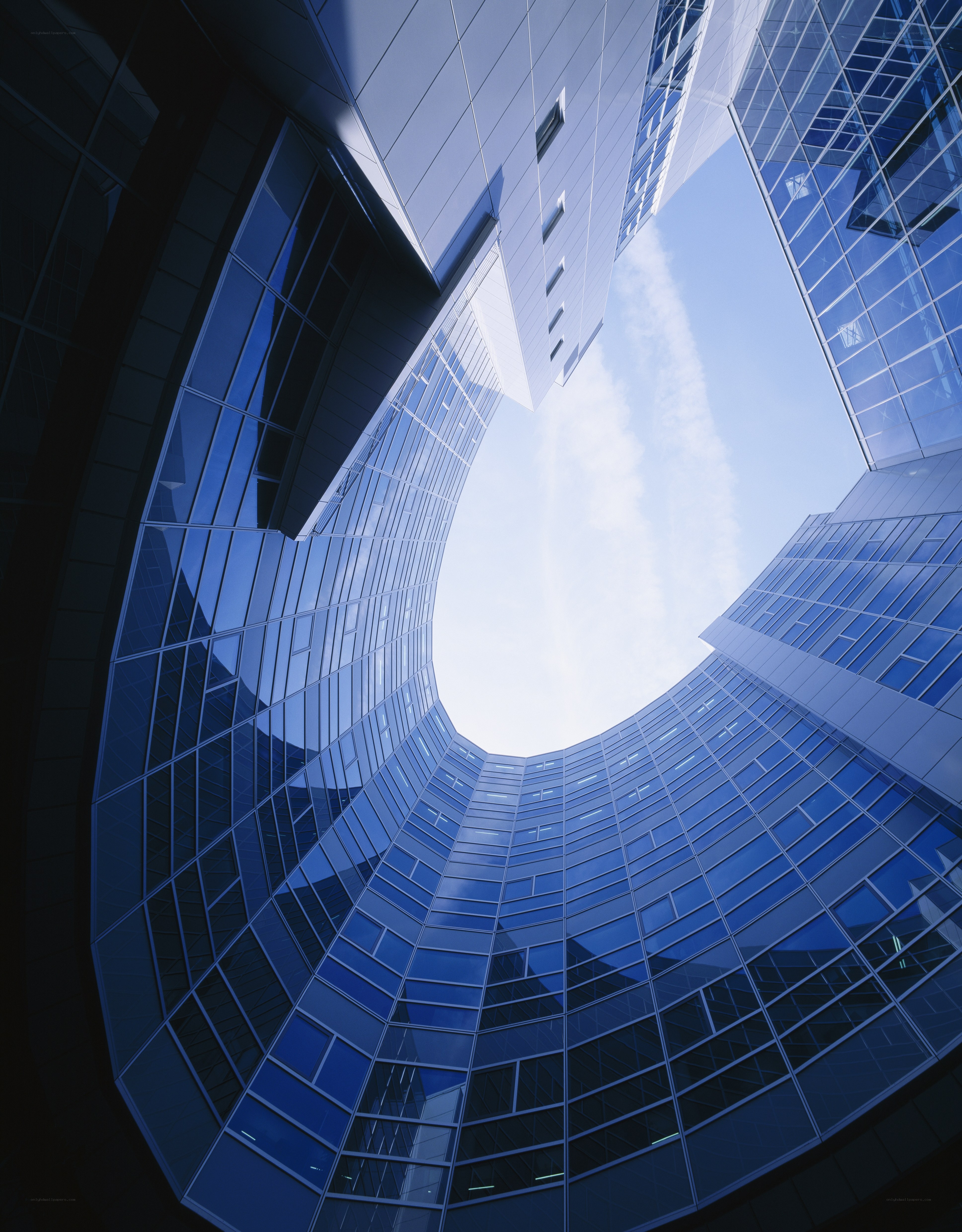 modern glass skyscraper courtyard