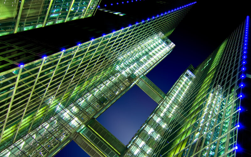 Modern glass skyscrapers at night