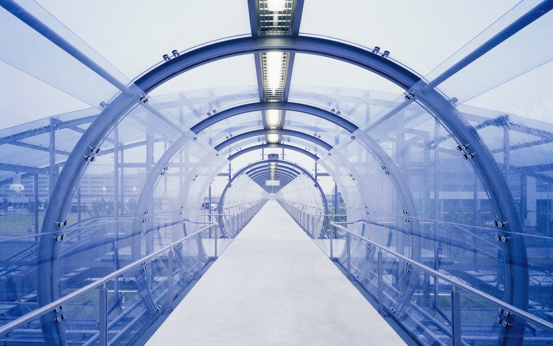 modern glass walkway tunnel