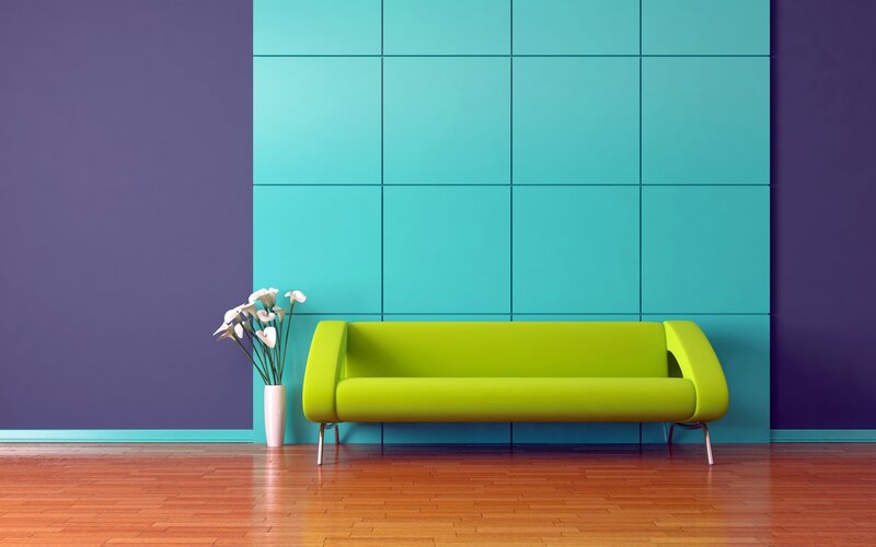 Modern green sofa in colorful room