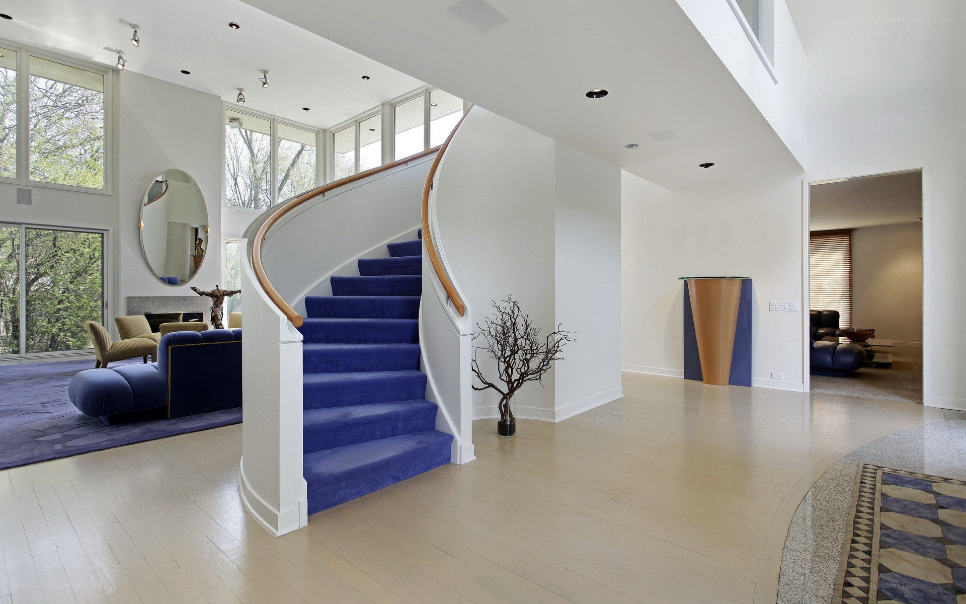 Modern home interior with blue staircase