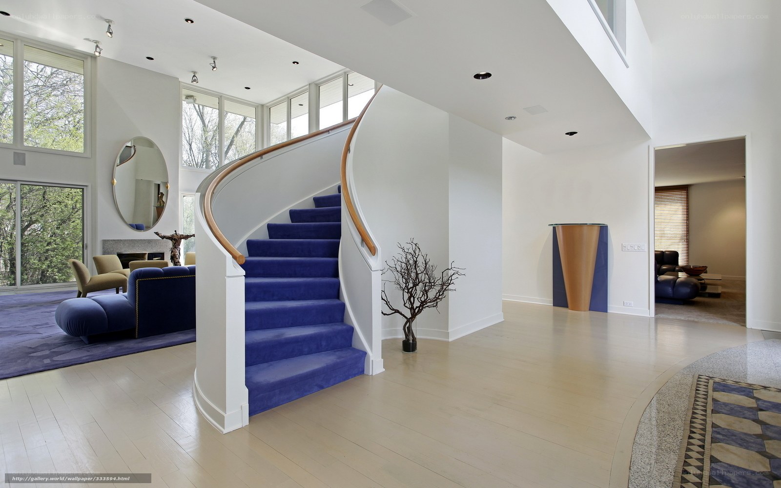 Modern home with blue staircase