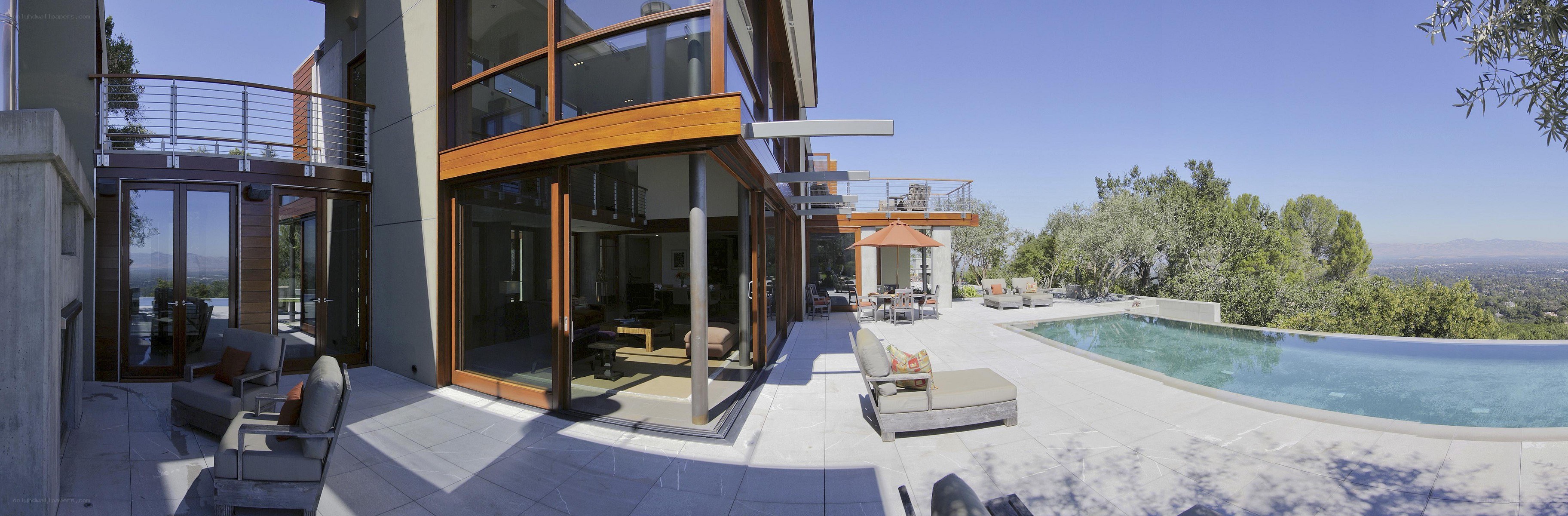 Modern home with pool and view