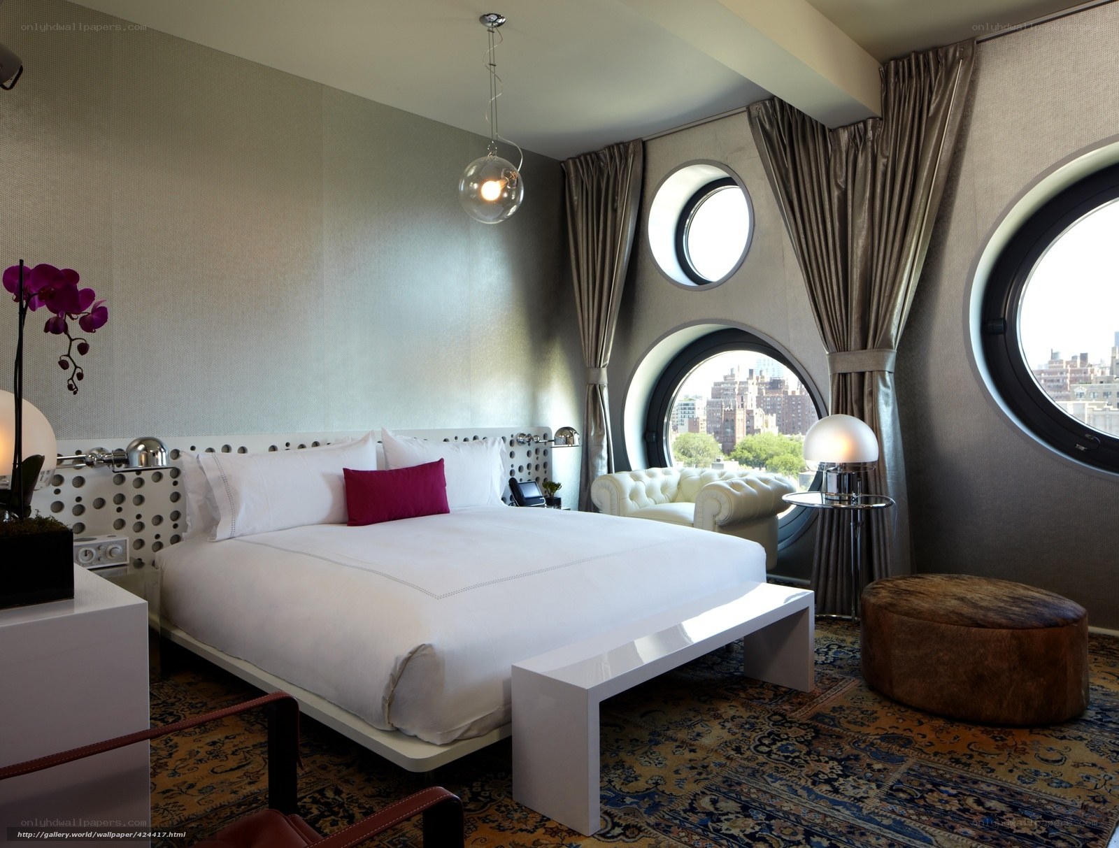 Modern hotel room with circular windows